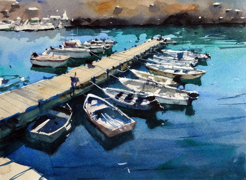 Small_boats_and_jetty_puerto_del_rosario