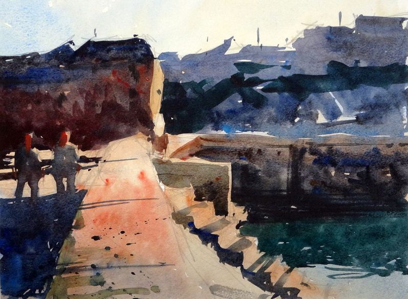 Walk_along_harbour_wall_porthleven